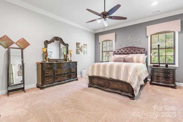 bedroom with light carpet, crown molding, visible vents, and baseboards