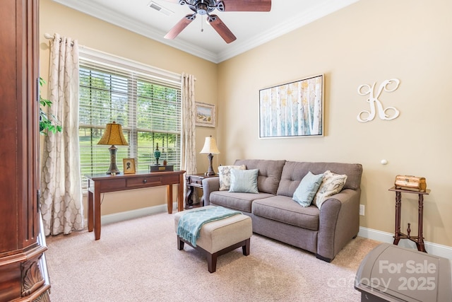 living area with ceiling fan, crown molding, carpet flooring, and visible vents