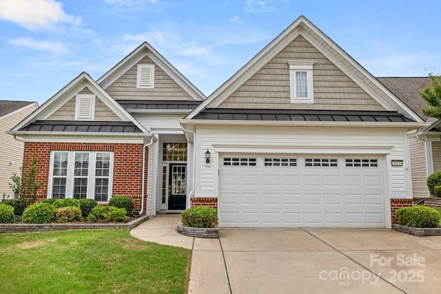 20135 Dovekie Ln, Fort Mill, SC 29707 - craftsman house featuring brick siding, a standing seam roof, and concrete driveway