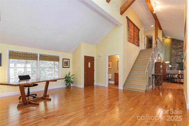 22 Robinhood Rd, Asheville, NC 28804 - entryway featuring high vaulted ceiling, beam ceiling, stairway, baseboards, and light wood-style floors