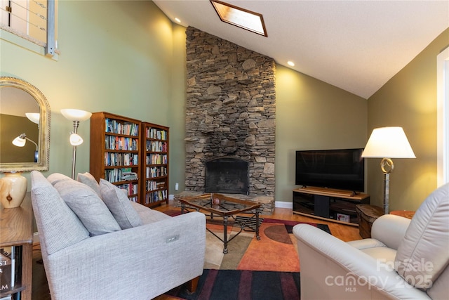 22 Robinhood Rd, Asheville, NC 28804 - living room featuring wood finished floors, a fireplace, and high vaulted ceiling