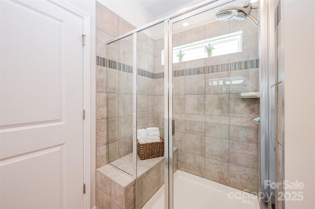 bathroom featuring a stall shower