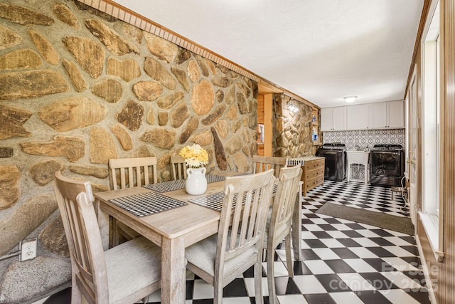 dining space with tile patterned floors