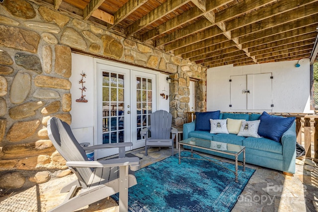 view of patio / terrace featuring french doors and an outdoor living space