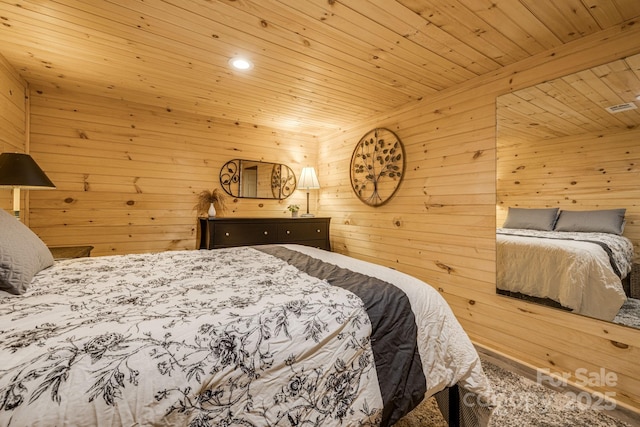 bedroom featuring recessed lighting, wooden walls, and wooden ceiling