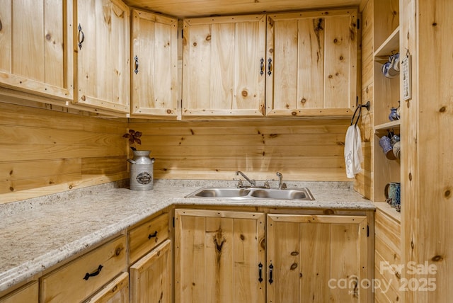 laundry area with a sink