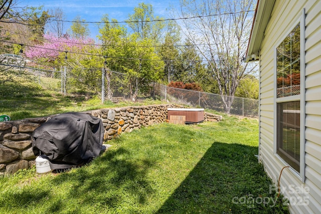 view of yard with a fenced backyard