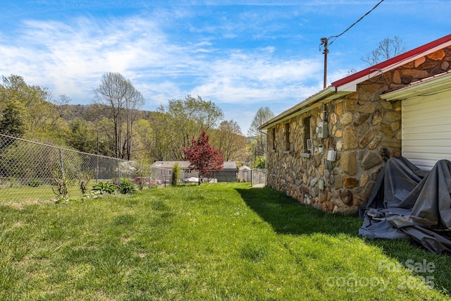 view of yard with fence