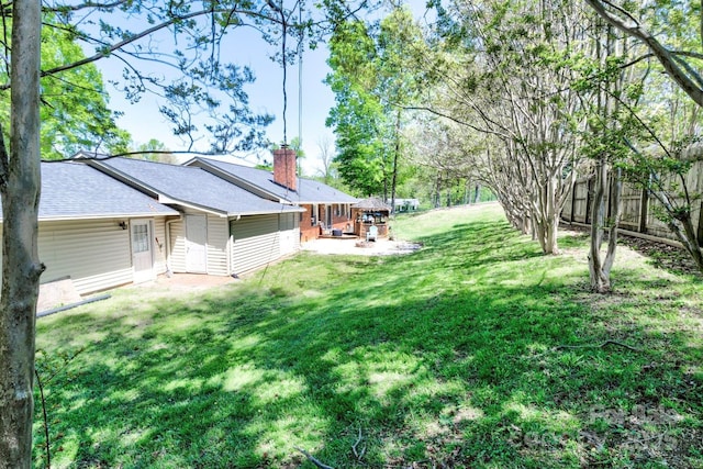 view of yard featuring fence