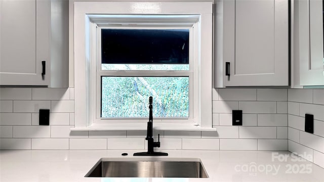 25 Dew Waite Rd, Black Mountain, NC 28711 - kitchen with light countertops, tasteful backsplash, and a sink
