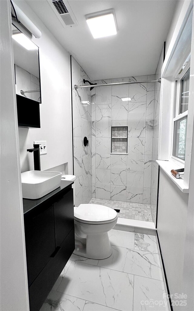 25 Dew Waite Rd, Black Mountain, NC 28711 - full bath featuring marble finish floor, visible vents, toilet, vanity, and a marble finish shower