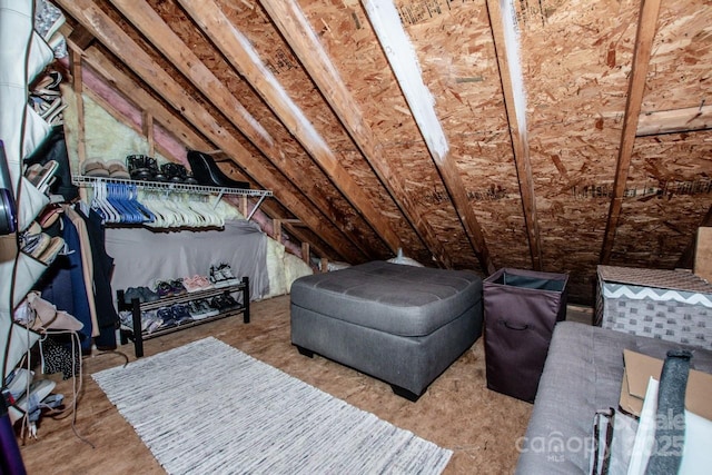 interior space featuring lofted ceiling
