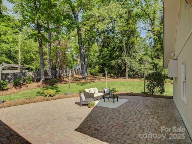 view of patio / terrace with a fenced backyard and an outdoor living space