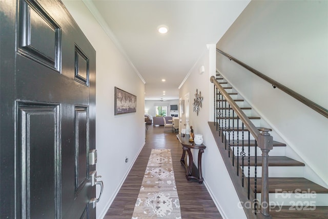 15520 Capps Rd, Charlotte, NC 28278 - foyer entrance with dark wood-type flooring, stairway, ornamental molding, recessed lighting, and baseboards