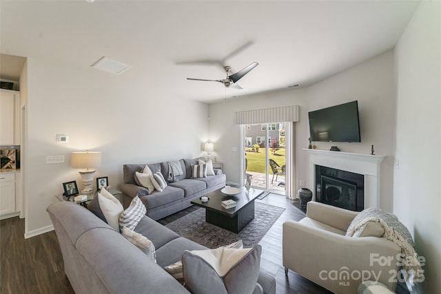 15520 Capps Rd, Charlotte, NC 28278 - living area with a ceiling fan, a glass covered fireplace, dark wood finished floors, and baseboards