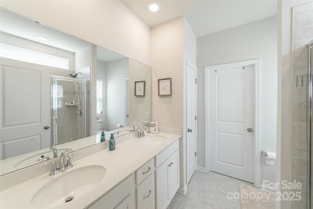 15520 Capps Rd, Charlotte, NC 28278 - full bath featuring a stall shower, toilet, double vanity, and tile patterned floors