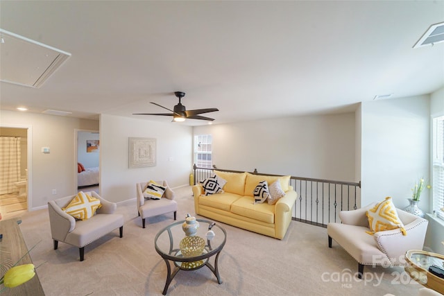 15520 Capps Rd, Charlotte, NC 28278 - living room with attic access, light carpet, a ceiling fan, and baseboards