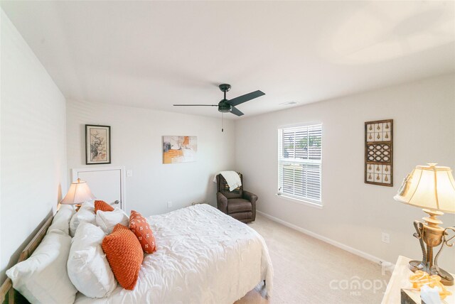 15520 Capps Rd, Charlotte, NC 28278 - bedroom featuring light colored carpet, a ceiling fan, and baseboards