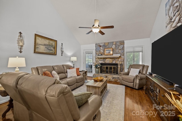16070 Palawan Ct, Tega Cay, SC 29708 - living area with high vaulted ceiling, a ceiling fan, wood finished floors, and a fireplace