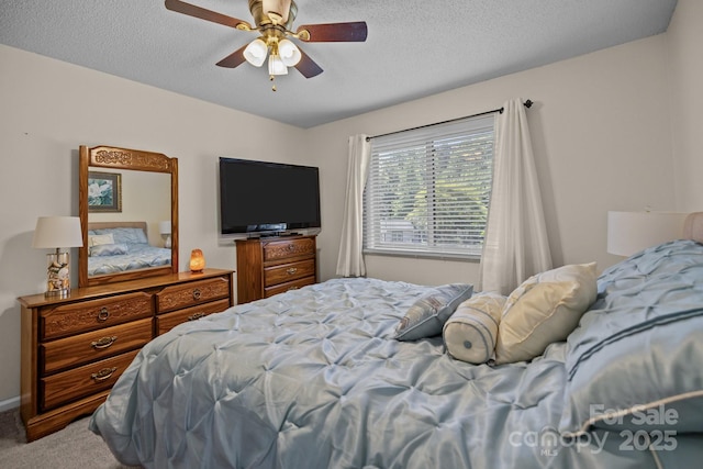 16070 Palawan Ct, Tega Cay, SC 29708 - carpeted bedroom featuring a textured ceiling and ceiling fan