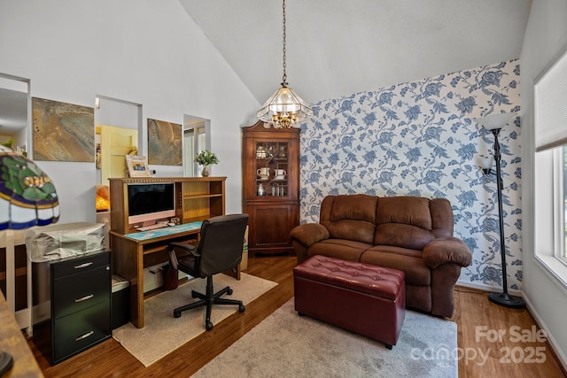 16070 Palawan Ct, Tega Cay, SC 29708 - office space featuring wood finished floors, high vaulted ceiling, and an inviting chandelier