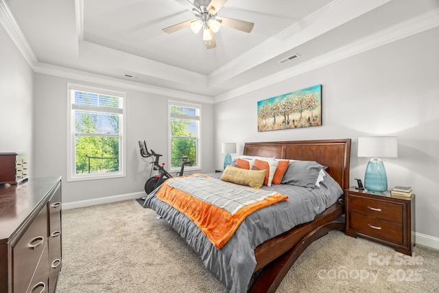 bedroom with baseboards, light colored carpet, and ornamental molding