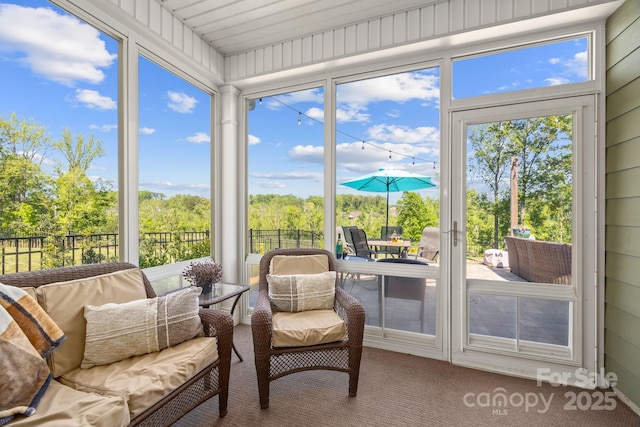 sunroom / solarium featuring a wealth of natural light