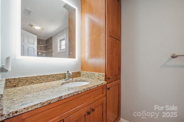 1592 Farmington Hills Dr, Conover, NC 28613 - bathroom featuring walk in shower, visible vents, and vanity