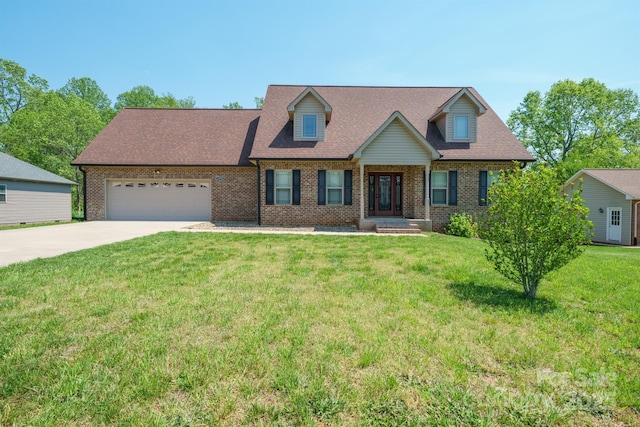 1592 Farmington Hills Dr, Conover, NC 28613 - cape cod-style house featuring brick siding, an attached garage, and driveway