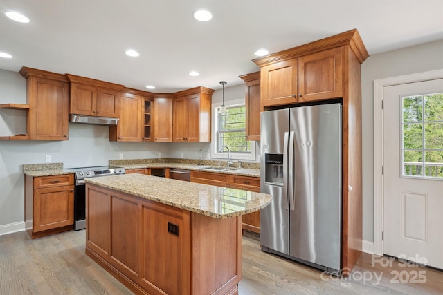 1592 Farmington Hills Dr, Conover, NC 28613 - kitchen with open shelves, a sink, brown cabinets, appliances with stainless steel finishes, and under cabinet range hood