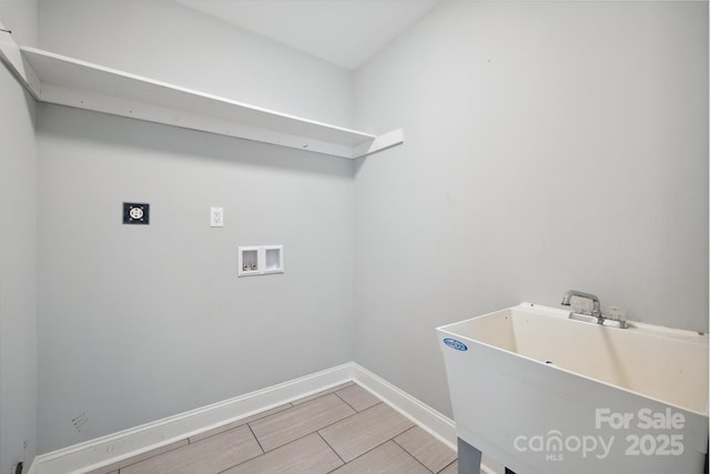1592 Farmington Hills Dr, Conover, NC 28613 - clothes washing area featuring hookup for a washing machine, hookup for an electric dryer, baseboards, wood finish floors, and laundry area