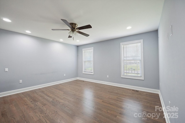 1592 Farmington Hills Dr, Conover, NC 28613 - empty room with a ceiling fan, recessed lighting, and dark wood-style flooring