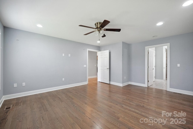 1592 Farmington Hills Dr, Conover, NC 28613 - empty room with baseboards, visible vents, recessed lighting, wood finished floors, and ceiling fan