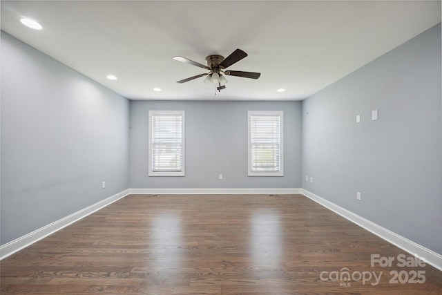 1592 Farmington Hills Dr, Conover, NC 28613 - spare room featuring recessed lighting, dark wood-type flooring, a ceiling fan, and baseboards