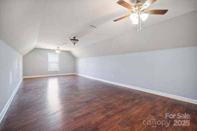 1592 Farmington Hills Dr, Conover, NC 28613 - additional living space featuring lofted ceiling, wood finished floors, a ceiling fan, and baseboards