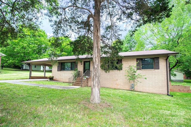 134 Piedmont Dr, Kannapolis, NC 28081 - ranch-style house with brick siding, a front lawn, and a carport