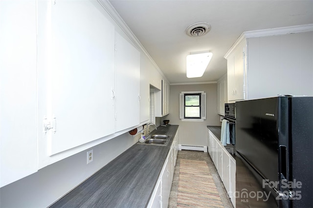 134 Piedmont Dr, Kannapolis, NC 28081 - kitchen with white cabinets, light wood-style flooring, a sink, visible vents, and black appliances