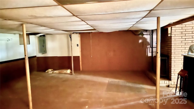 134 Piedmont Dr, Kannapolis, NC 28081 - unfinished basement featuring electric panel and a drop ceiling