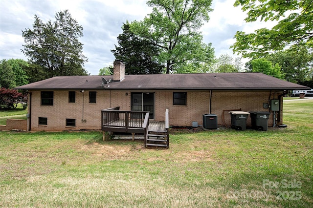 134 Piedmont Dr, Kannapolis, NC 28081 - rear view of house with a chimney, a yard, cooling unit, a wooden deck, and brick siding