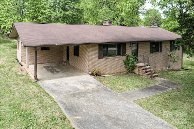 134 Piedmont Dr, Kannapolis, NC 28081 - ranch-style house featuring brick siding, driveway, a shingled roof, and a front yard