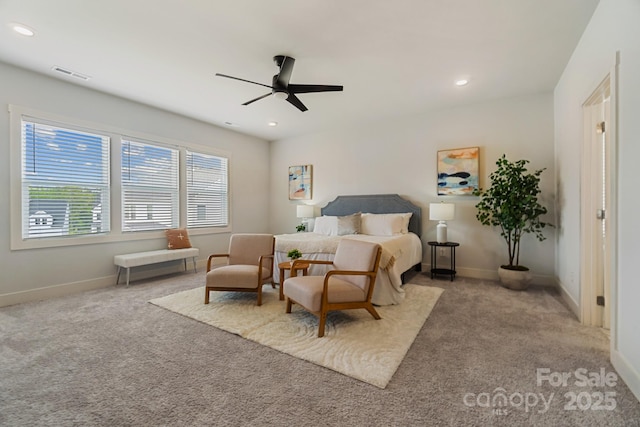 bedroom featuring baseboards, visible vents, ceiling fan, and carpet flooring
