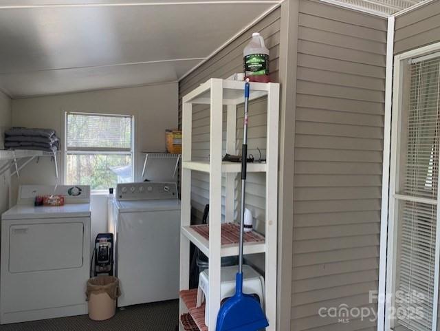 laundry room featuring independent washer and dryer and laundry area