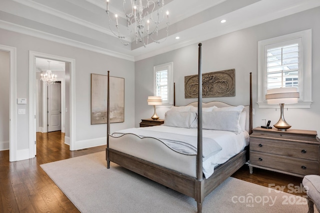 17909 Golden Meadow Ct, Davidson, NC 28036 - bedroom with a chandelier, dark wood-style floors, recessed lighting, baseboards, and ornamental molding