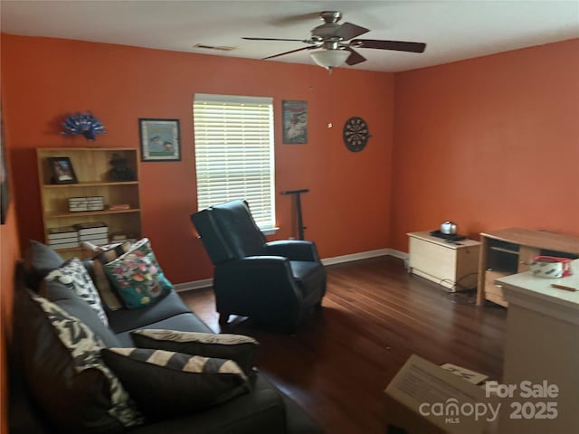 1104 Valley St, Statesville, NC 28677 - living area with ceiling fan, dark wood finished floors, and baseboards