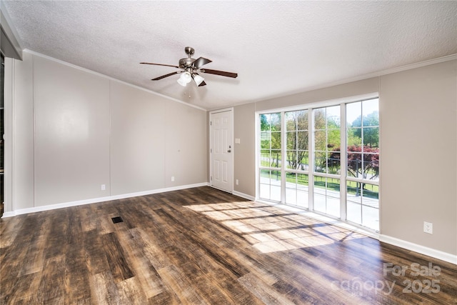 spare room with wood finished floors, ceiling fan, a textured ceiling, and ornamental molding