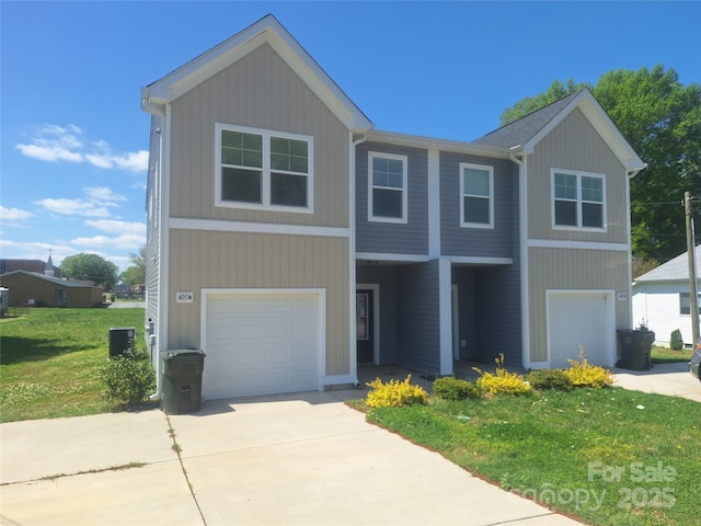 405 N Mulberry St, Cherryville, NC 28021 - view of front facade with concrete driveway, an attached garage, a front lawn, and central air condition unit