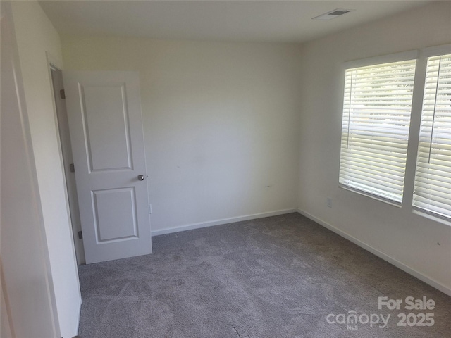 405 N Mulberry St, Cherryville, NC 28021 - carpeted empty room with visible vents and baseboards
