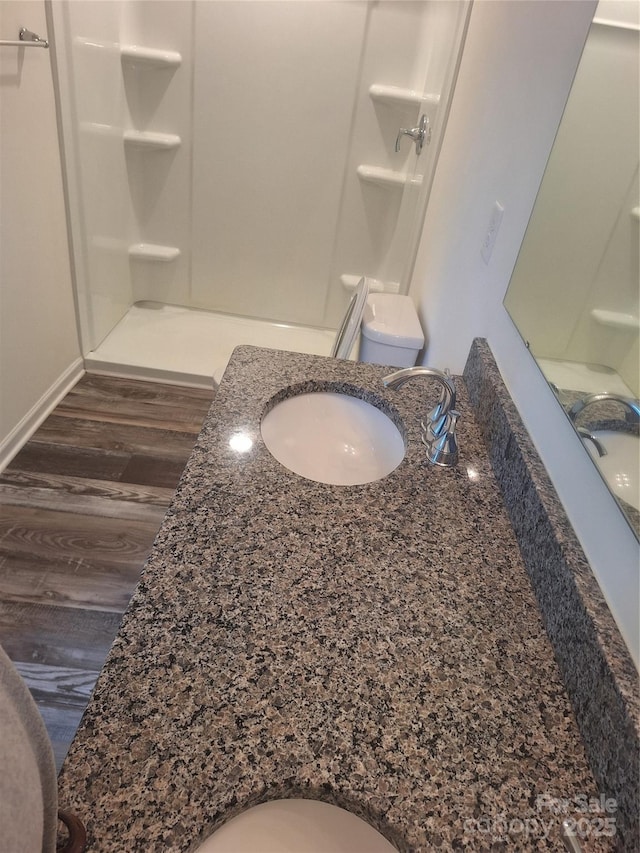 405 N Mulberry St, Cherryville, NC 28021 - bathroom featuring vanity, toilet, and wood finished floors