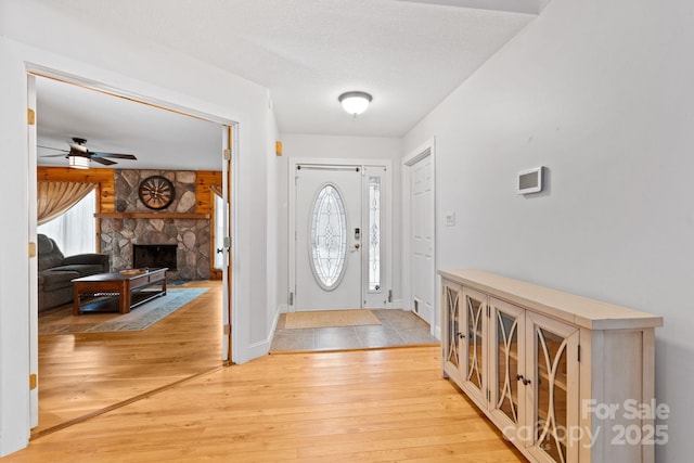 3670 Maple Creek Rd, Rutherfordton, NC 28139 - entrance foyer featuring healthy amount of natural light, a ceiling fan, and light wood-type flooring