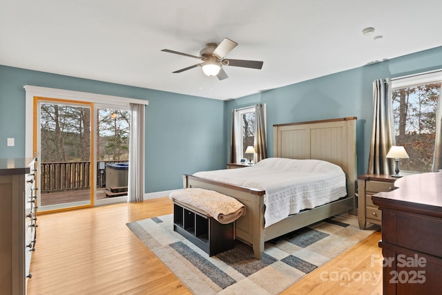 3670 Maple Creek Rd, Rutherfordton, NC 28139 - bedroom featuring access to outside, wood finished floors, and ceiling fan